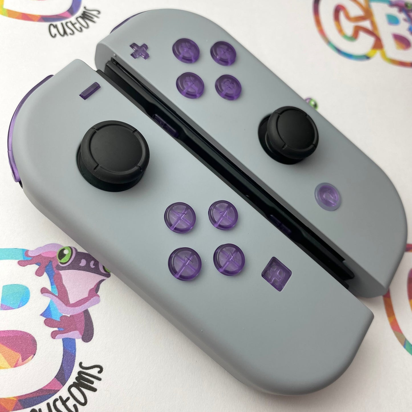 New Hope Gray & Clear Purple Buttons Nintendo Switch Joycons - Custom Nintendo Switch Joycon Controllers
