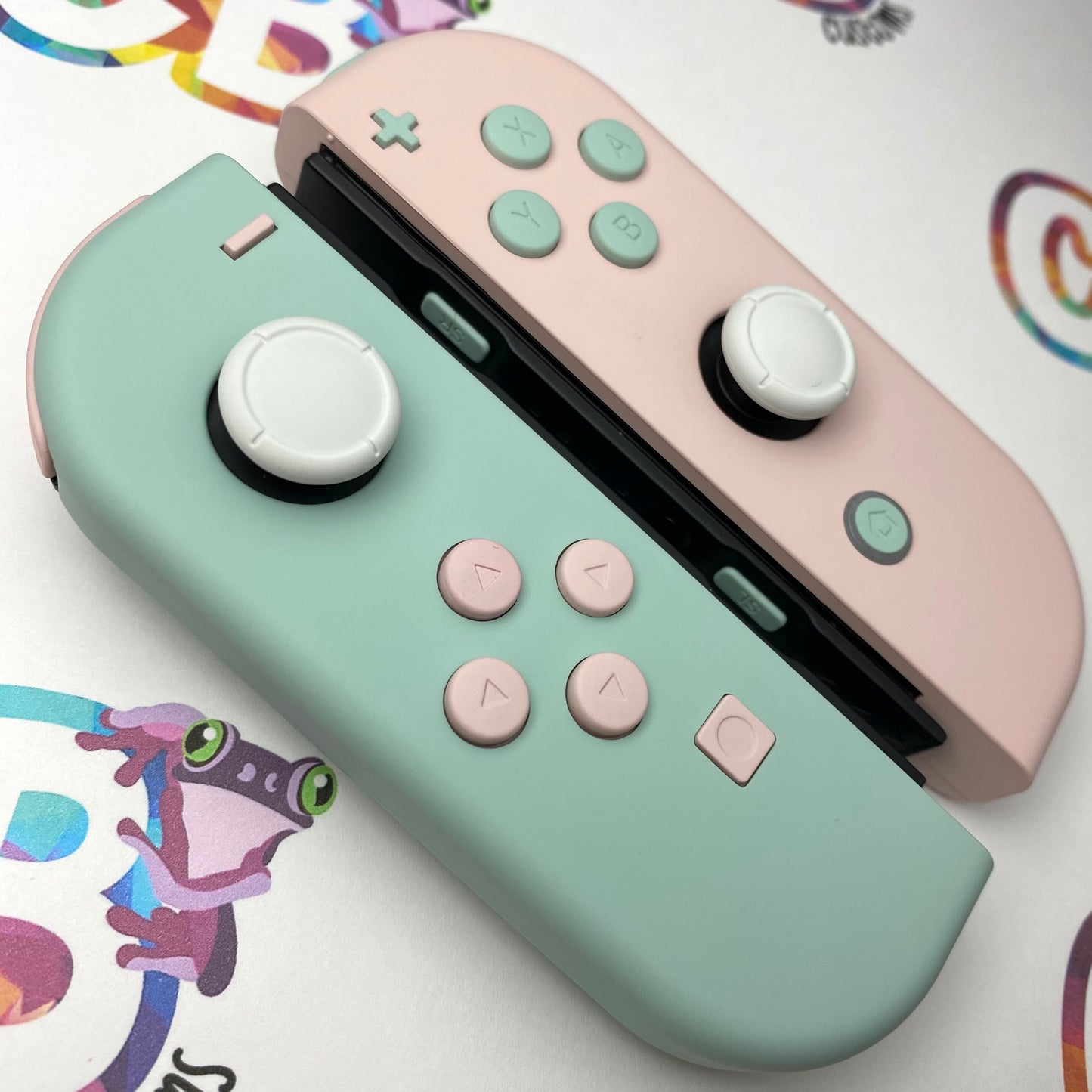 Light Cyan & Sakura Pink with opposite color buttons Nintendo Switch Joycons Buttons Nintendo Switch Joycons - Custom Nintendo Switch Joycon Controllers