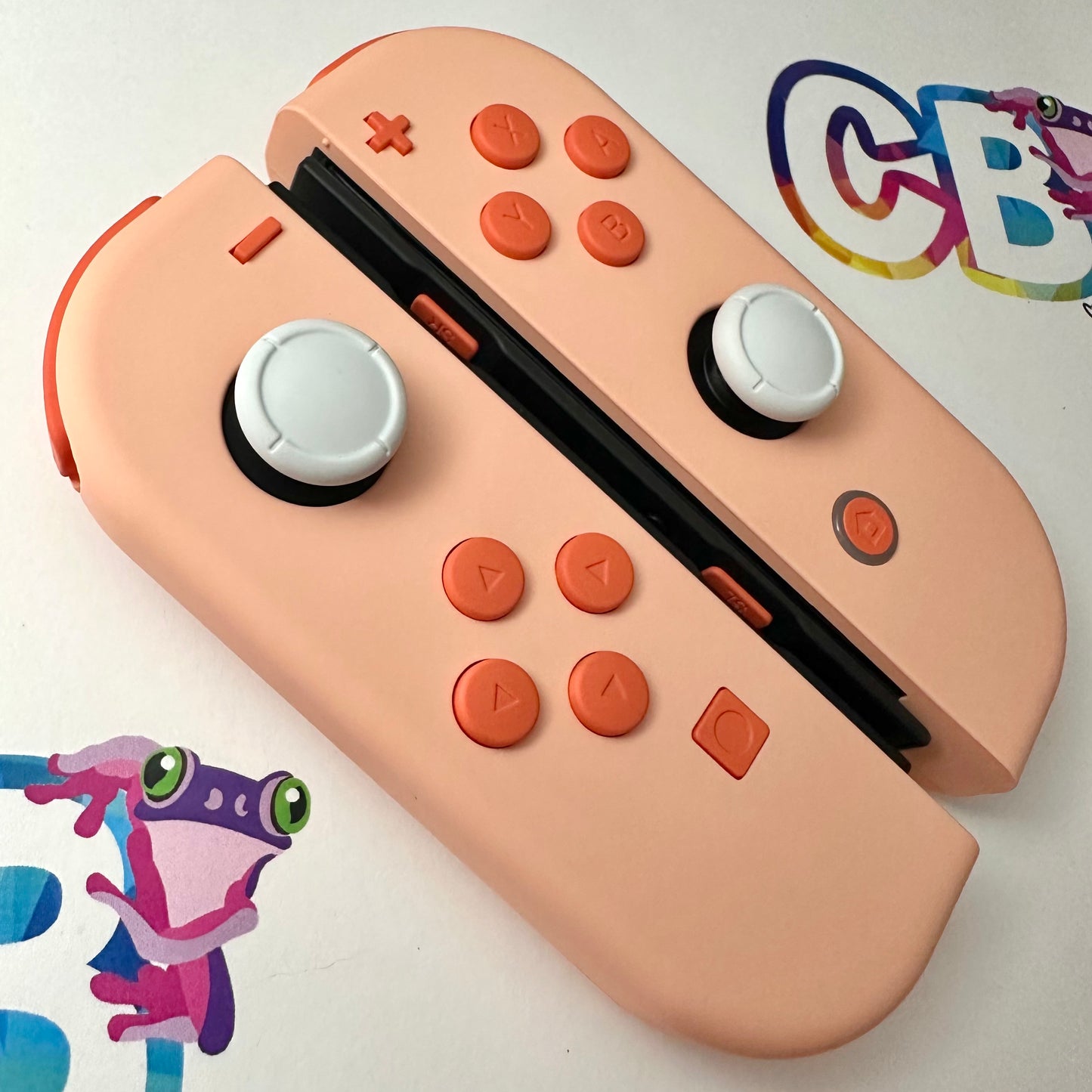 Mandys Pink & Coral Orange Buttons Joy-Cons - Custom Nintendo Switch Joycon Controllers